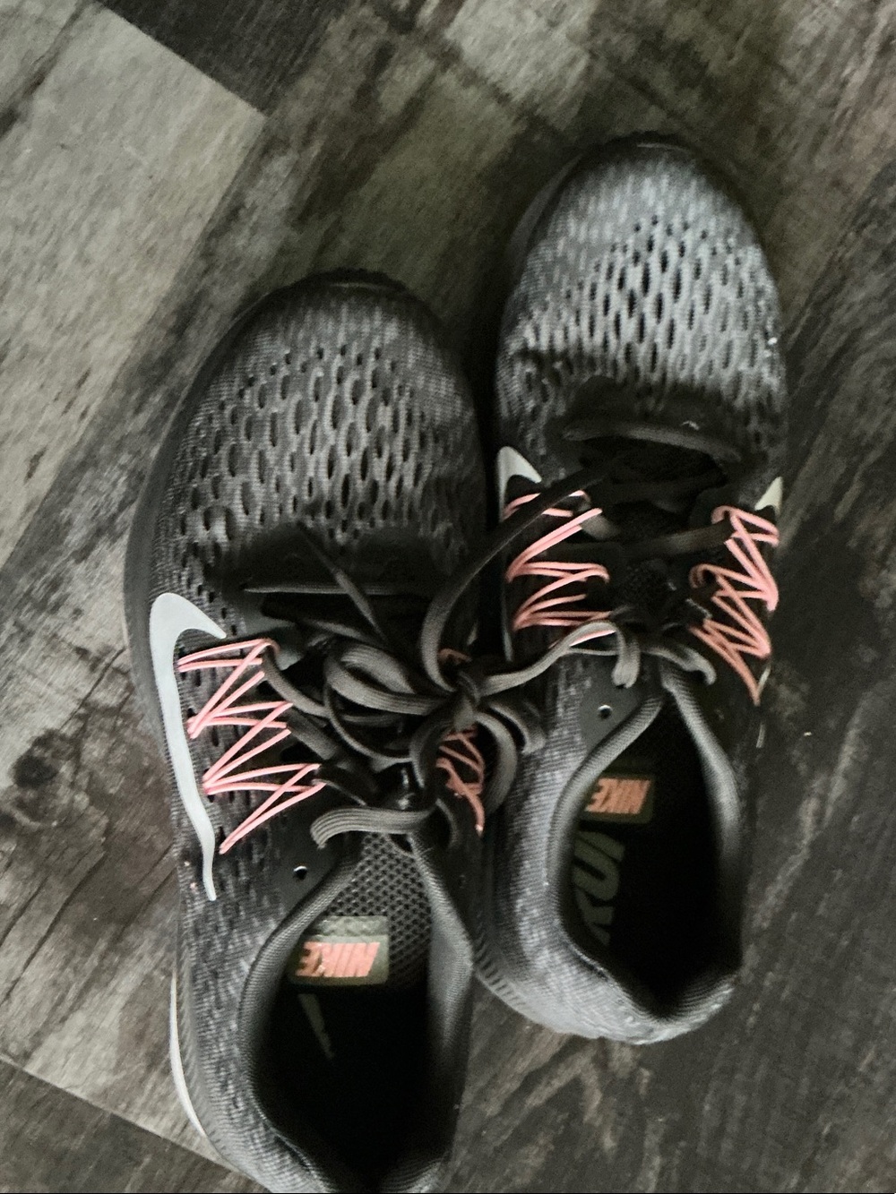 Nike Women’s Black Athletic Shoes with Pink Lace Details